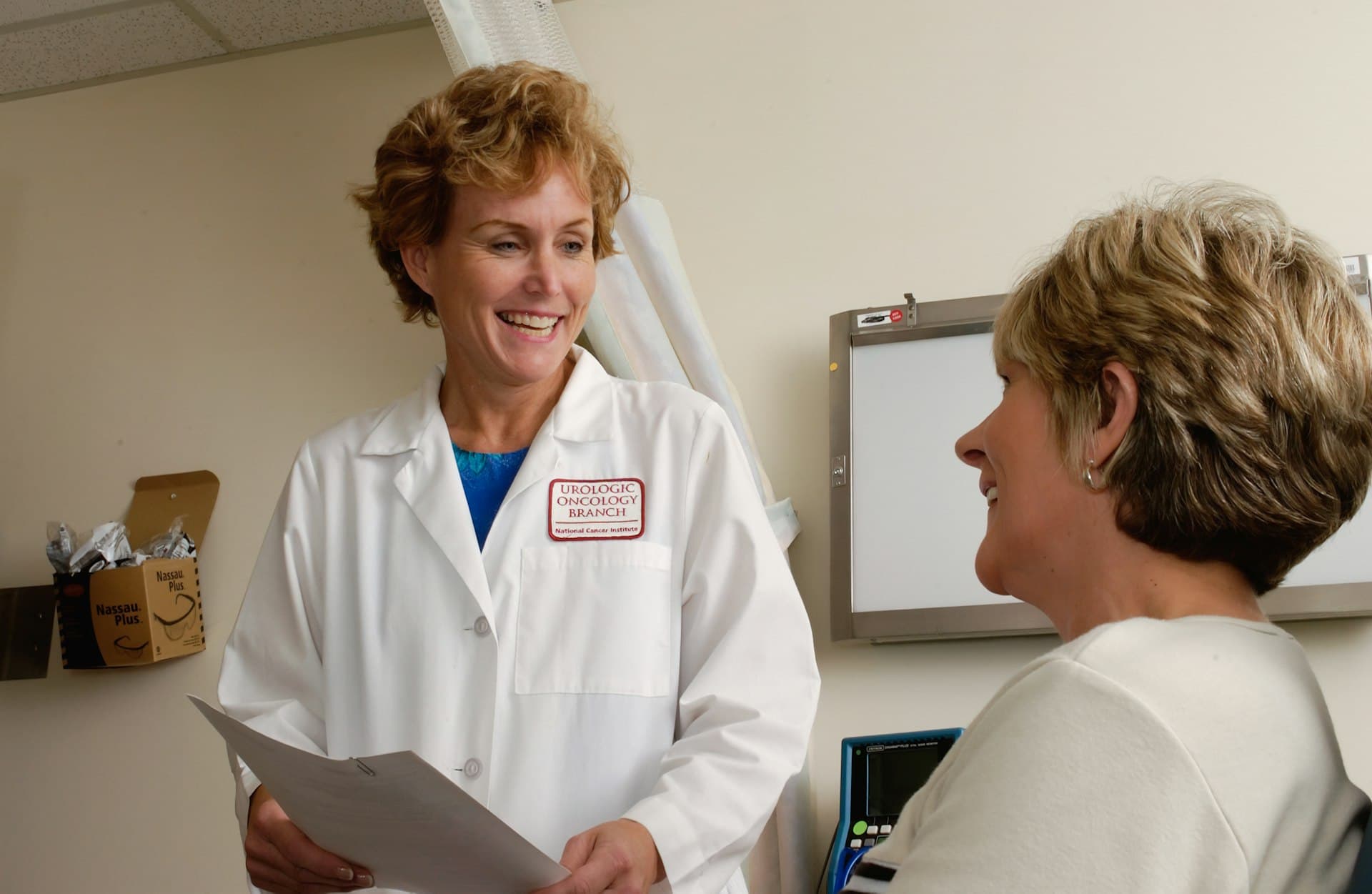 Doctor consulting with a patient in a clinical setting